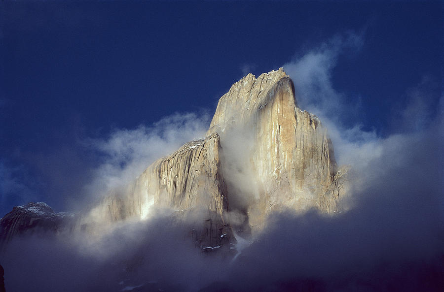 Nature Photograph - Trango Tower In Morning Mist Karakoran by Geoff Gabites