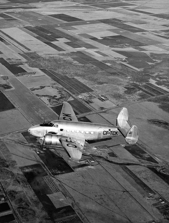 Landscape Photograph - Trans-Canada Passenger Plane by Underwood Archives