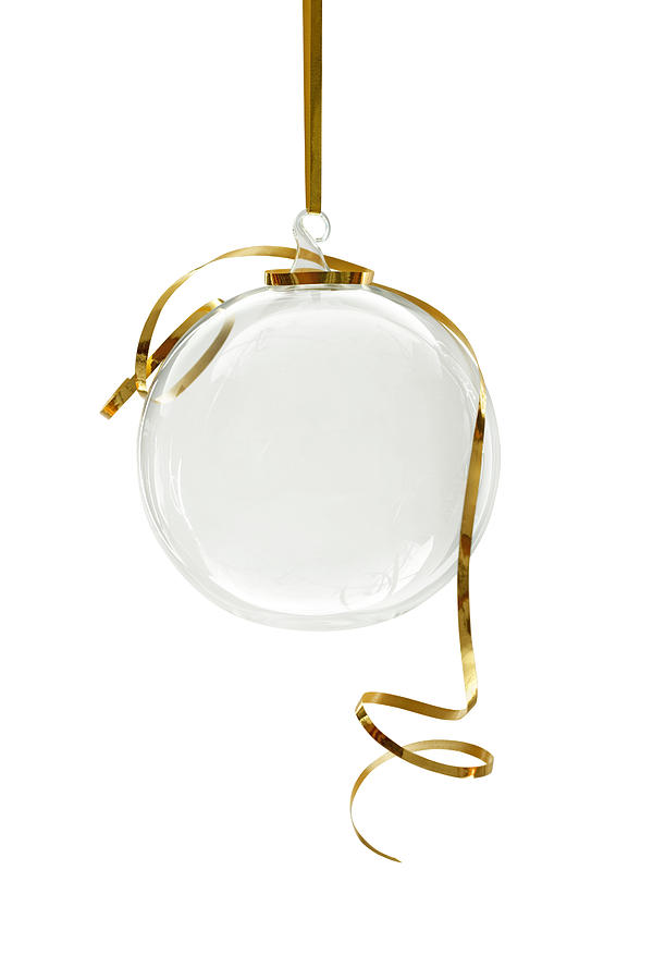 Transparent Christmas ornament hanging on a white background Photograph by Kamisoka