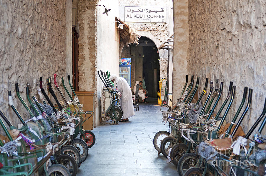Transport Wheelbarrows In Old Souk Of Doha Qatar  Photograph by JM Travel Photography