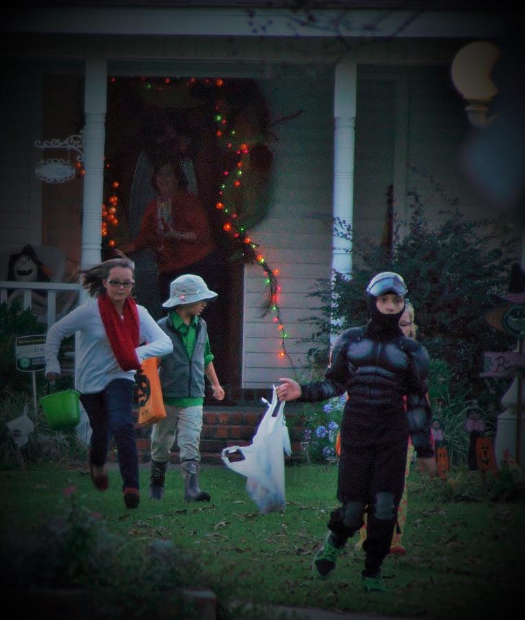 Trickers  or  Treaters Photograph by John Glass