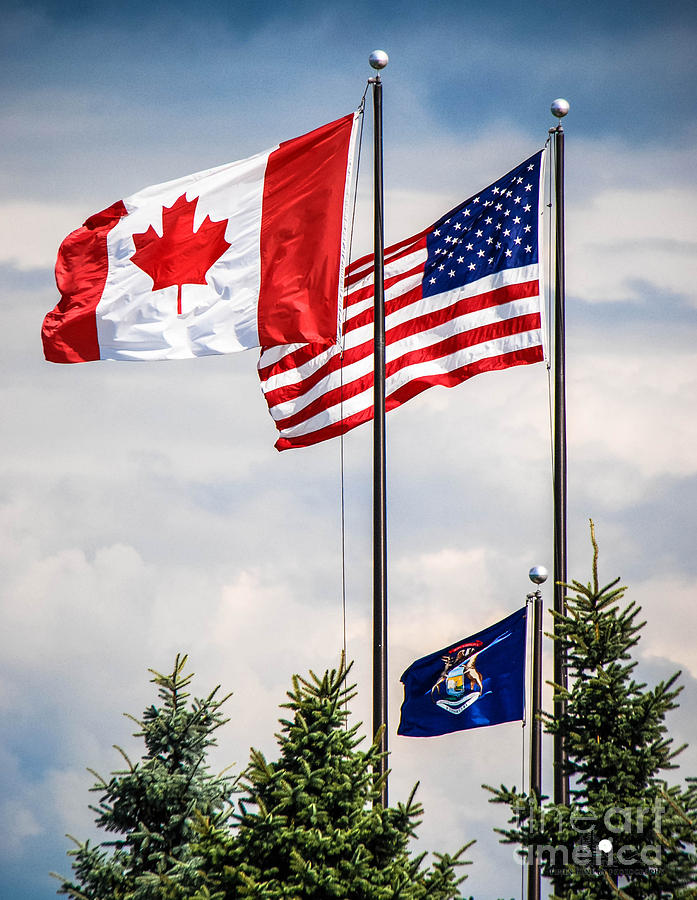 Trio of Flags Photograph by Grace Grogan