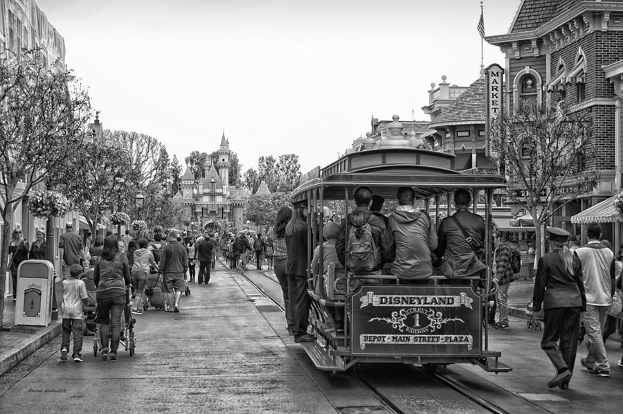 Transportation Photograph - Trolley Car Main Street Disneyland BW by Thomas Woolworth