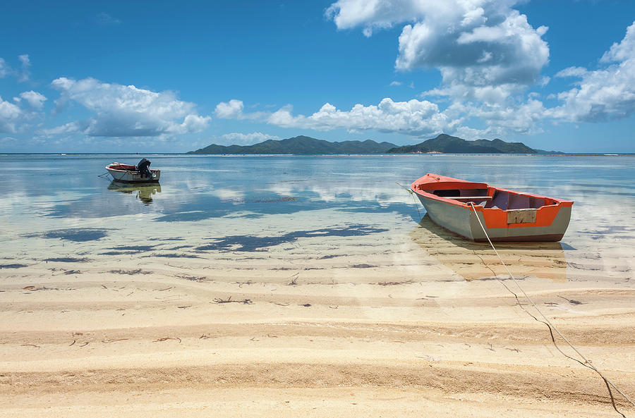 Tropical Island Lagoon Boats Moored On Photograph by Fotovoyager