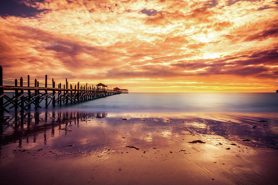 Tropical Sunset On The Ocean And Pier Photograph by Zodebala