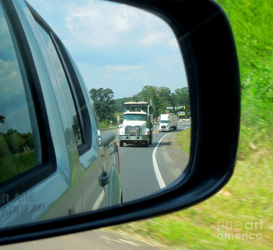 Trucks In Rear View Mirror Photograph by Renee Trenholm