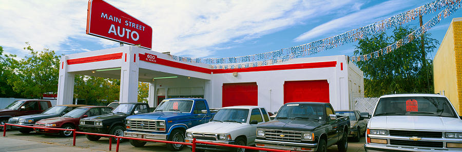 Architecture Photograph - Trucks In Used Car Lot, Roswell, New by Panoramic Images
