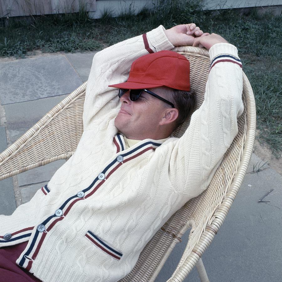 Truman Capote Leaning Back In A Chair Photograph by Horst P. Horst