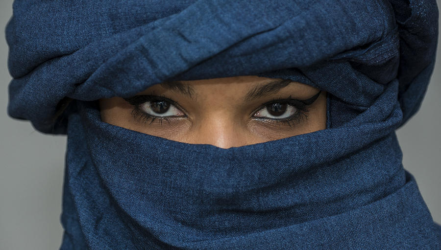 Tuareg girl, Targia, veiled with Chech fabrics, eyes, Algeria Photograph by Gunter LenzX
