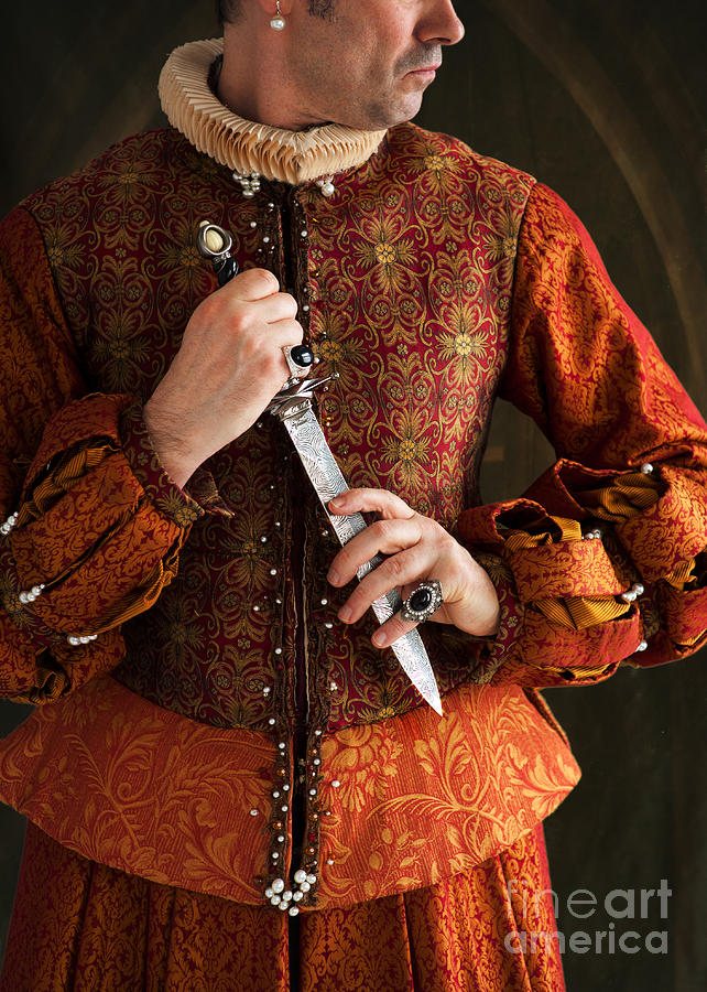 Tudor Man Holding A Dagger Photograph by Lee Avison