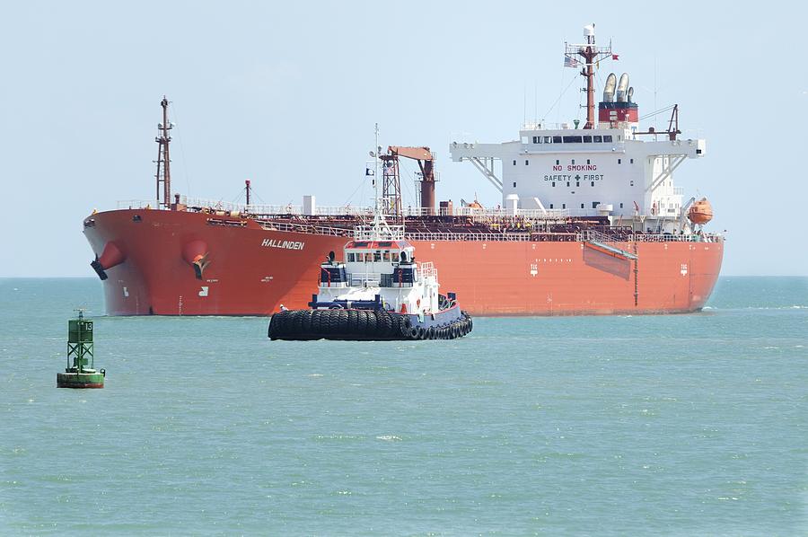 Tug approaching tanker Photograph by Bradford Martin