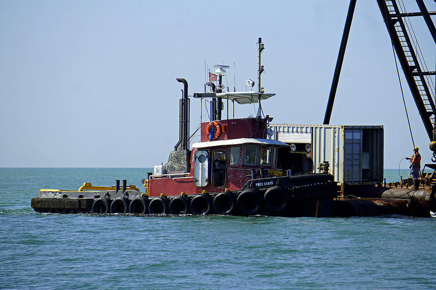 Tug at Work Photograph by Laurie Perry