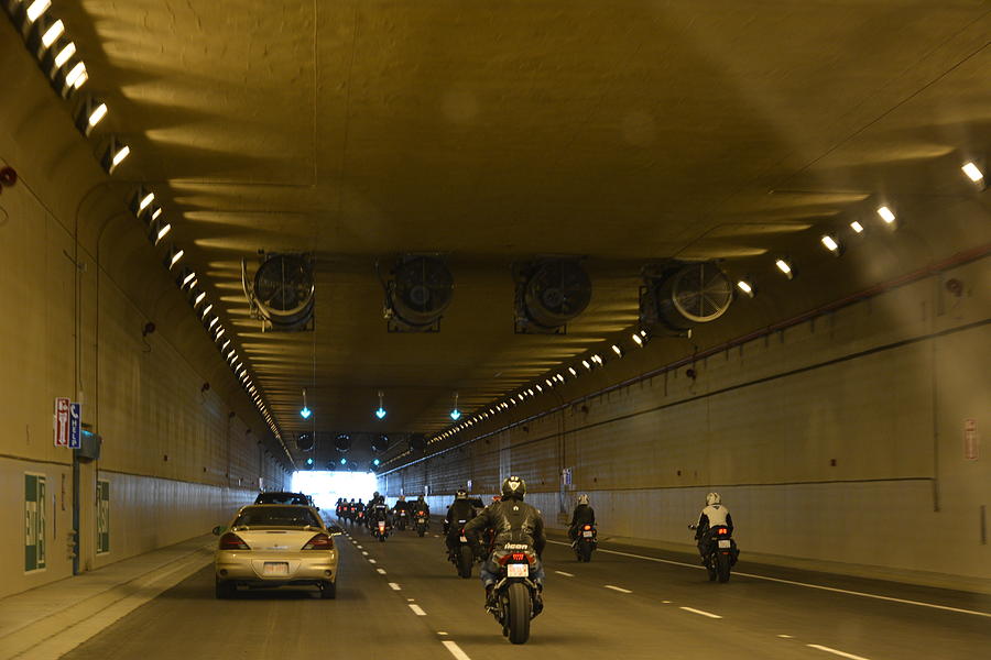 Tunnel Riding  Photograph by Evelina Popilian