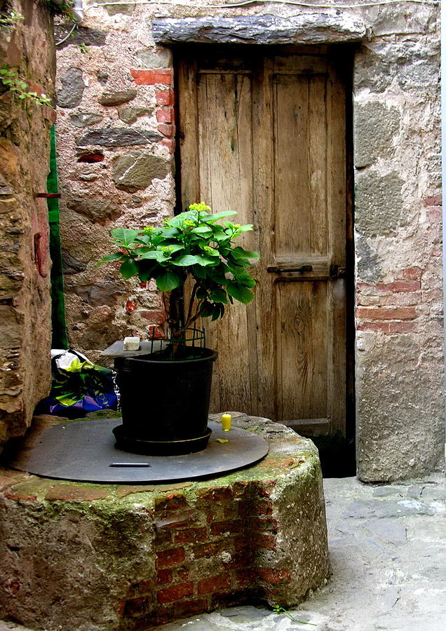 Brick Photograph - Tuscany Italy - Door and Candle by Jacqueline M Lewis
