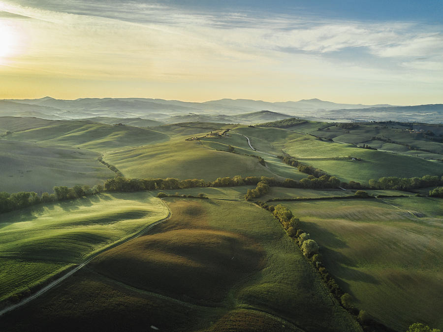 Tuscany landscape at sunrise with low fog Photograph by FilippoBacci