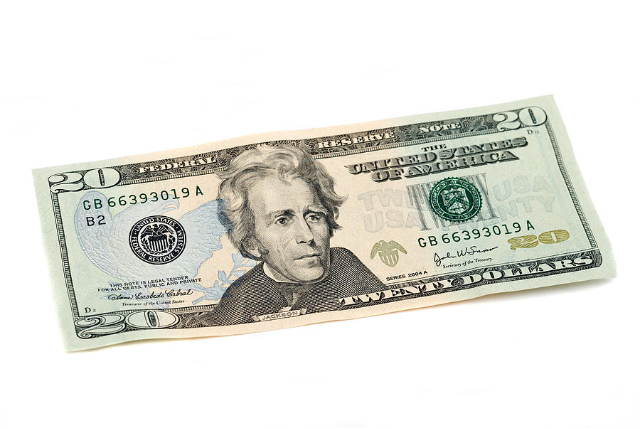 Twenty dollar bill United States currency on white Photograph by NoDerog