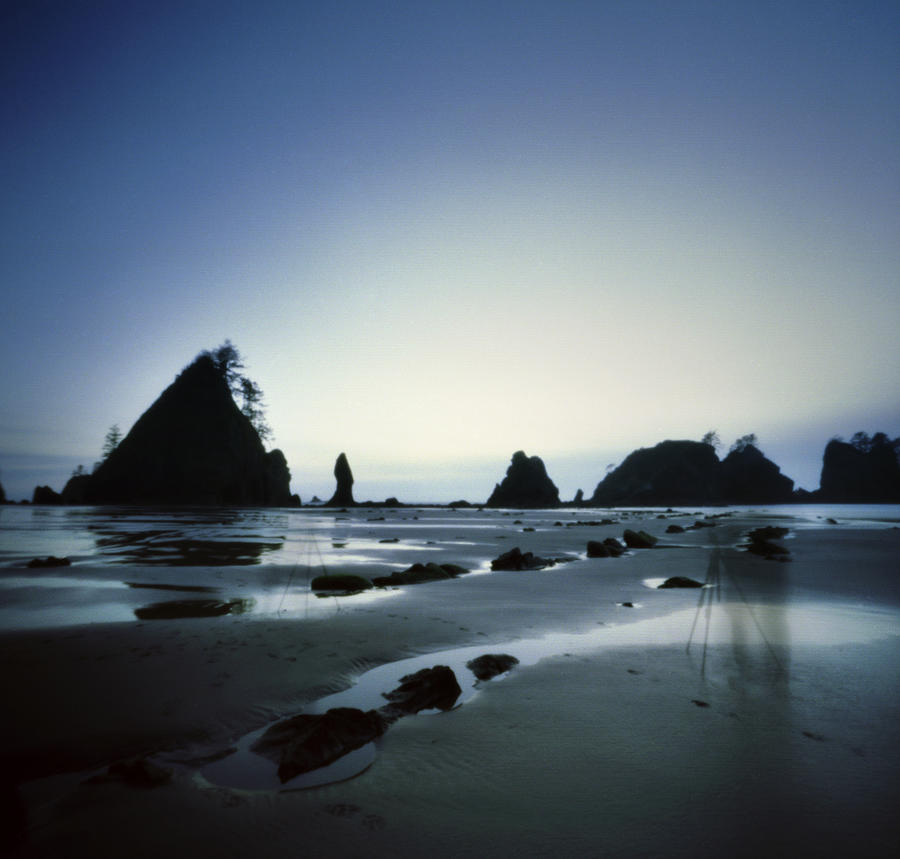 Twilight Falls On Sea Stacks At Coast Photograph by Danielle D. Hughson