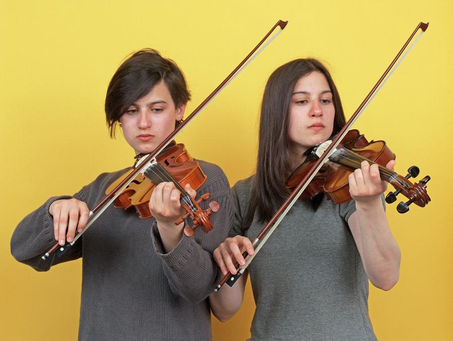 Twins Playing Violins Photograph by Alex Bartel/science Photo Library