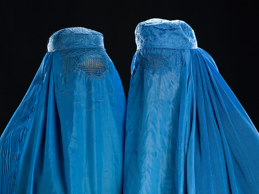 Two Afghan women wearing their burkha Photograph by Juanmonino