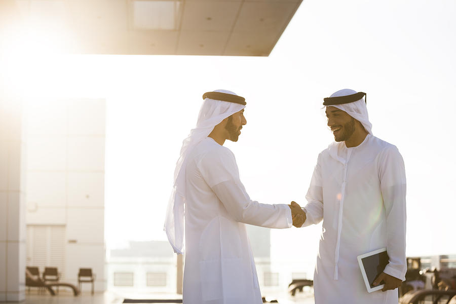 Two Arab Men Shaking Hands Photograph by Visualspace