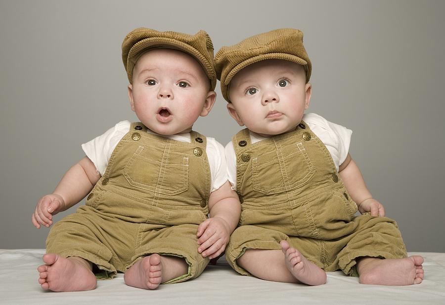 Hat Photograph - Two Babies In Matching Hat And Overalls by Kelly Redinger