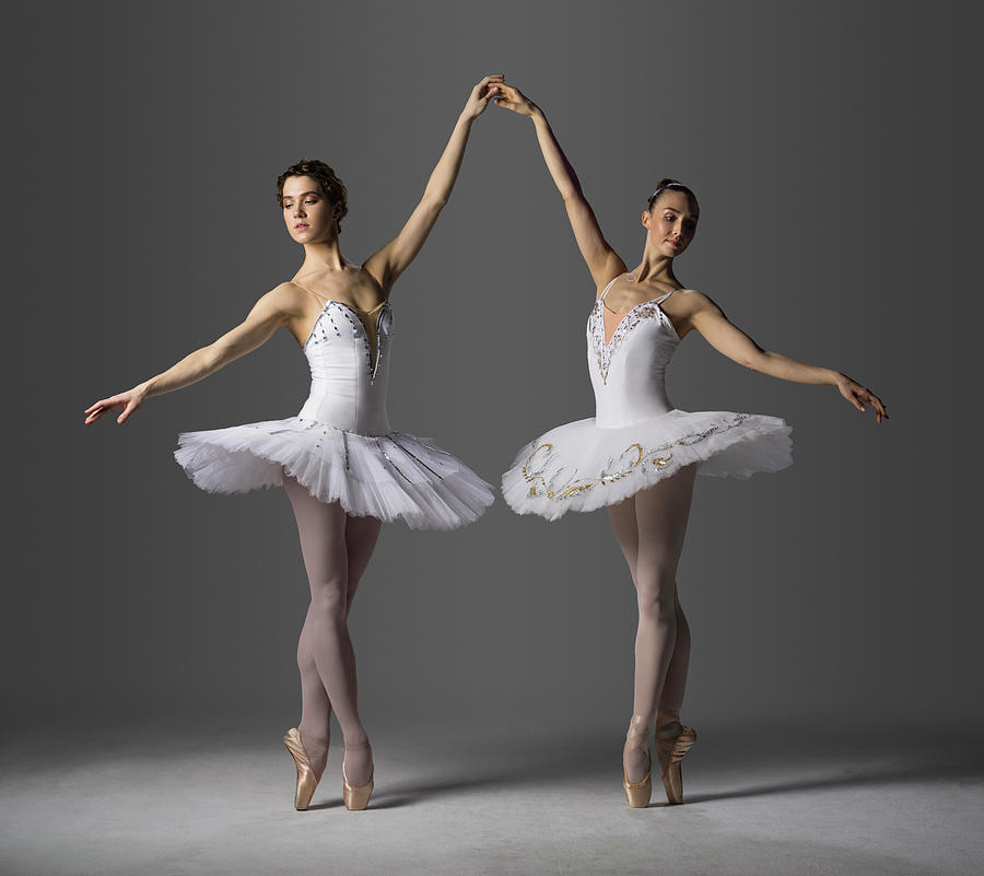 Two Ballerinas Performing Relevé On Photograph by Nisian Hughes