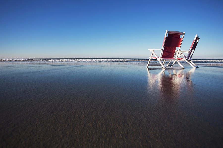 Beach Photograph - Two Beach Chairs On Wet Sand In York by Chris Hackett