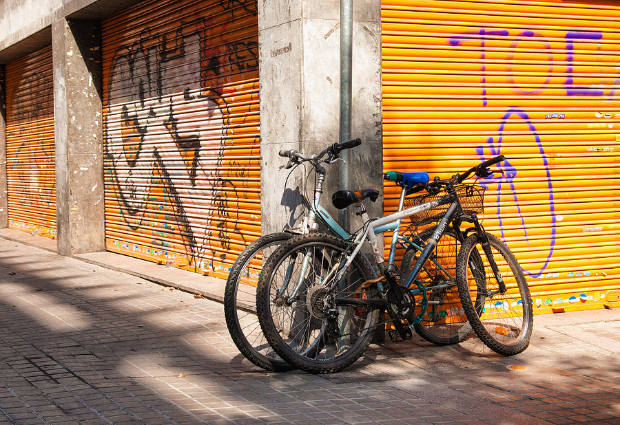 Two bicycles in the streets of Barcelona Photograph by Matthias Hauser