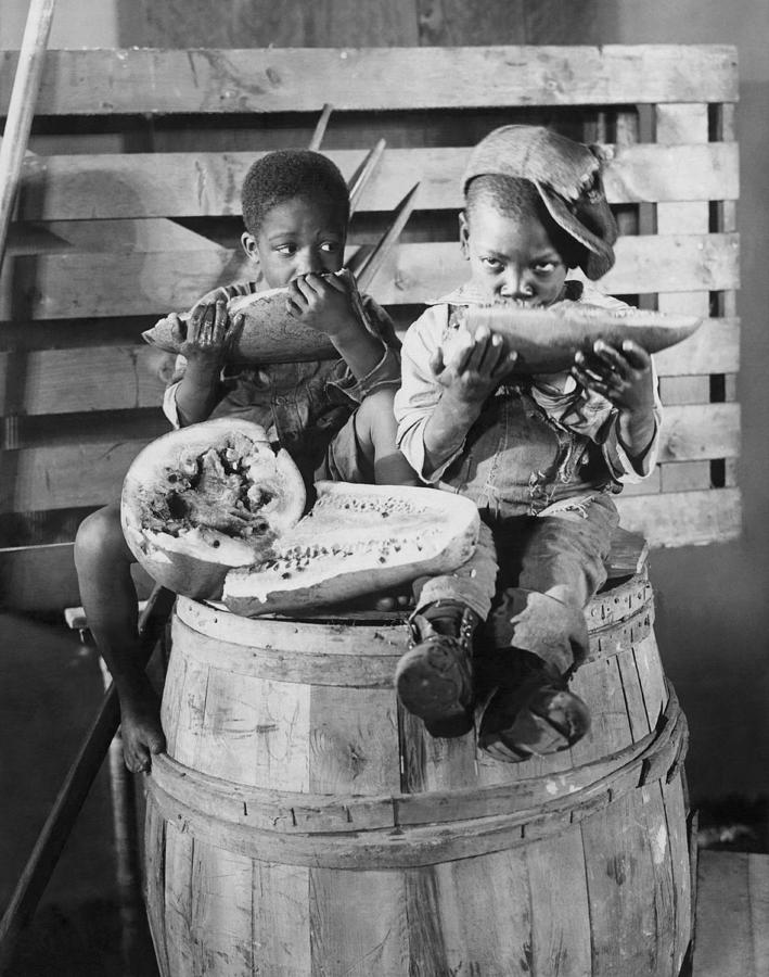 Two Boys Eating Watermelon Photograph by Underwood Archives
