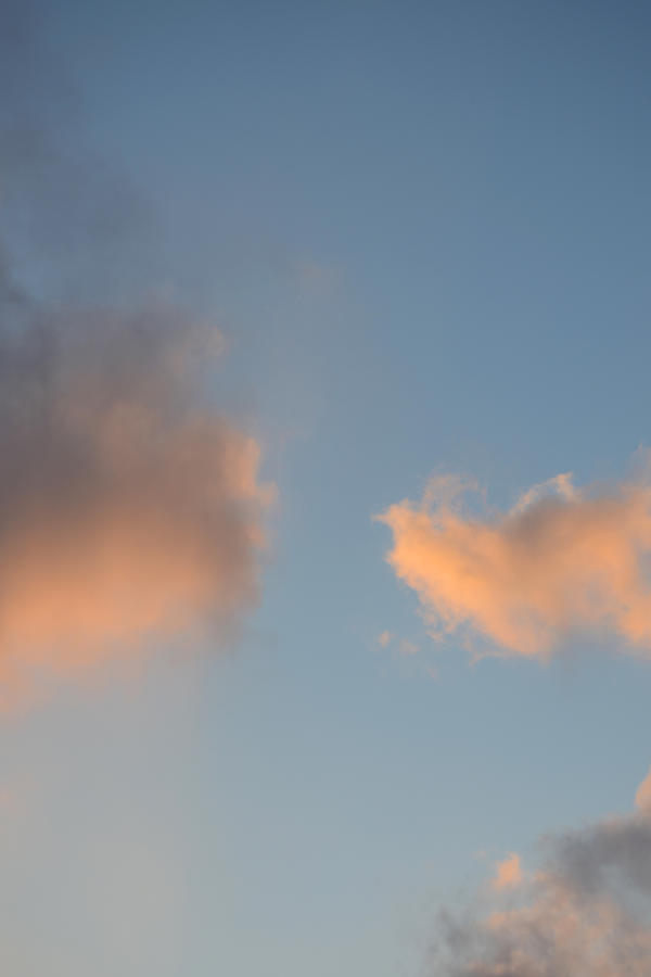 Two Clouds Facing Photograph by Jenny Forker - Fine Art America