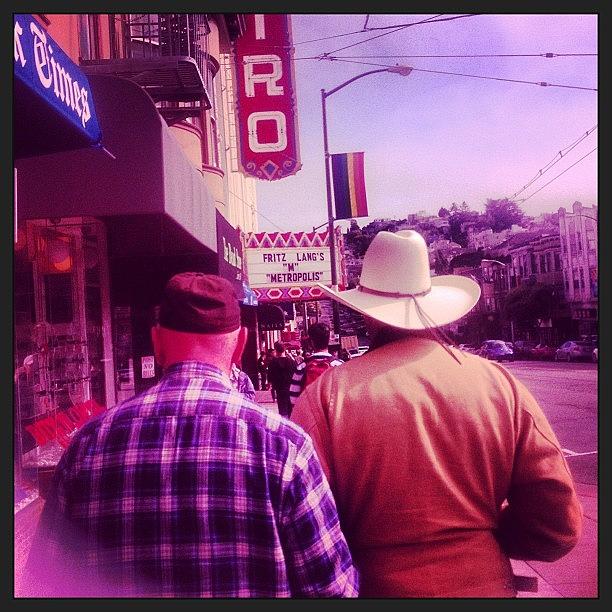 Sign Photograph - Two Country Boys In The Castro #cowboy by Lynn Friedman