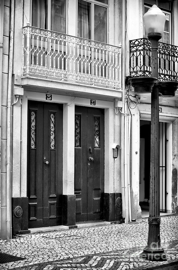 Two Doors in Aveiro Photograph by John Rizzuto