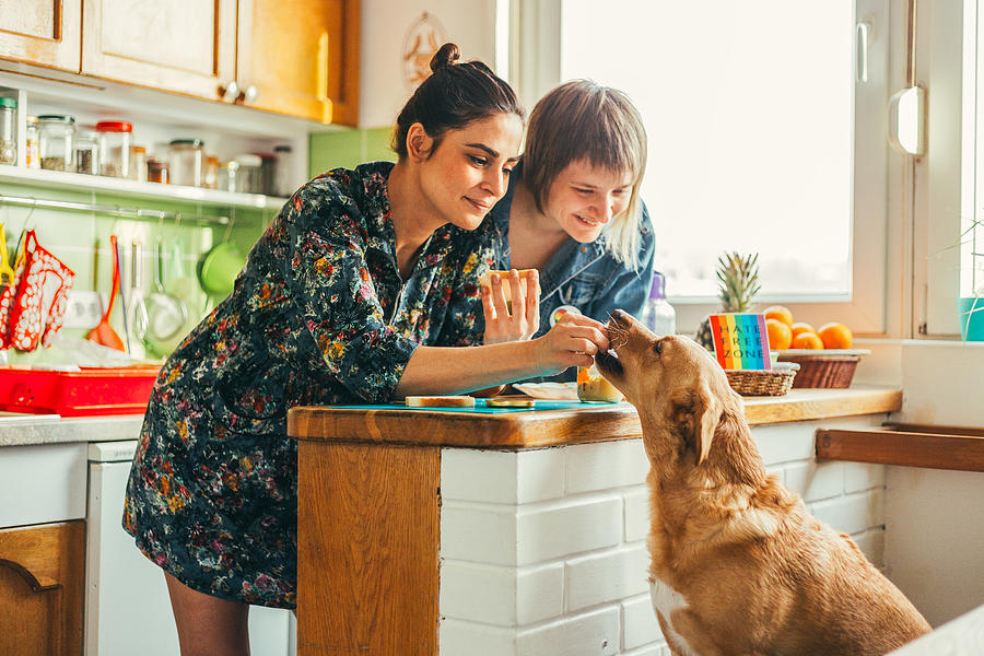 Two females enjoing breakfast at home Photograph by Obradovic