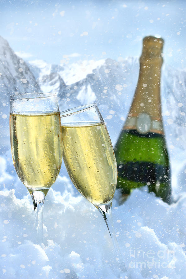 Two glasses of champagne with bottle in snow Photograph by Sandra Cunningham