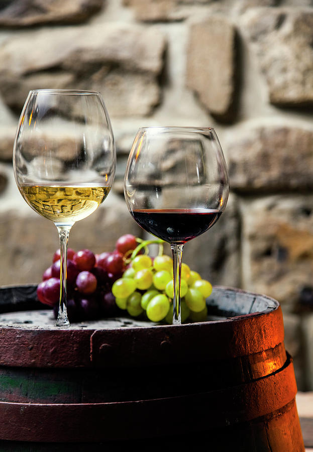 Two Glasses Of Red And White Wine In Photograph by Piranka
