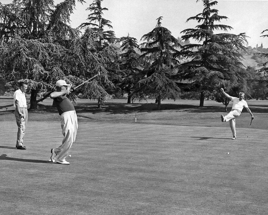 Two Golfers Body English Photograph by Underwood Archives
