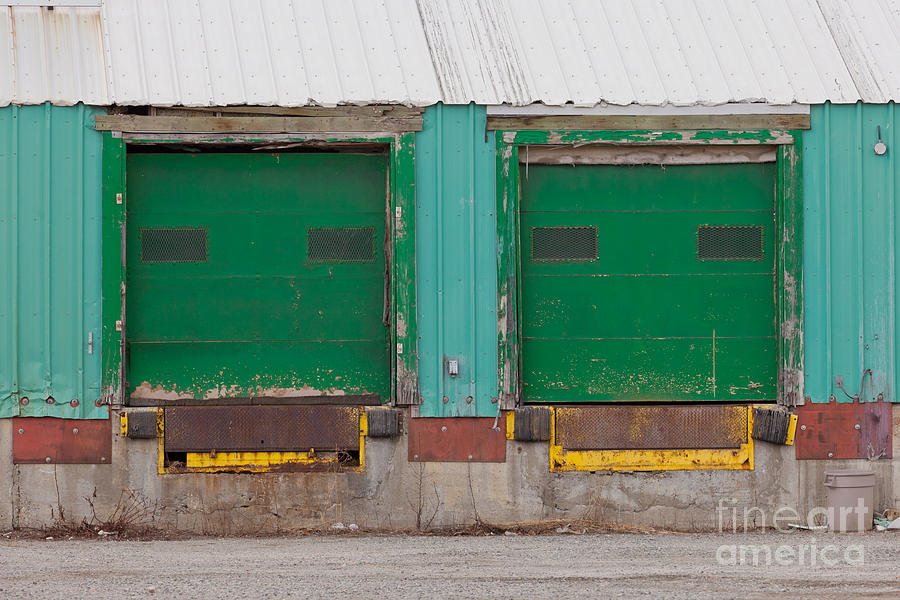Architecture Photograph - Two green shuttered outside loading gate ramps by Stephan Pietzko
