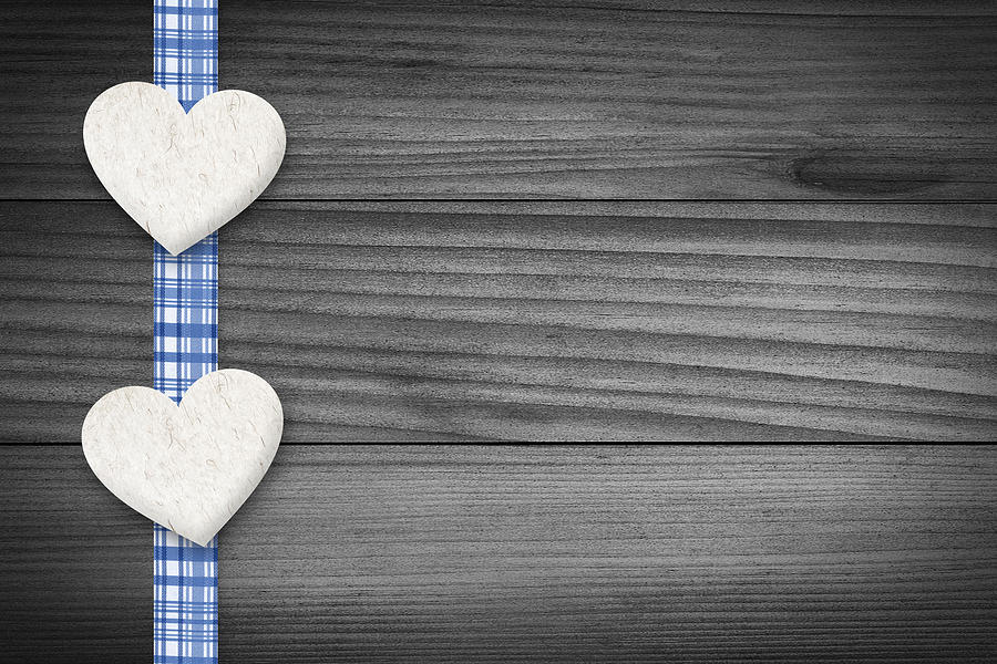 Christmas Photograph - Two hearts laying on wood by Aged Pixel