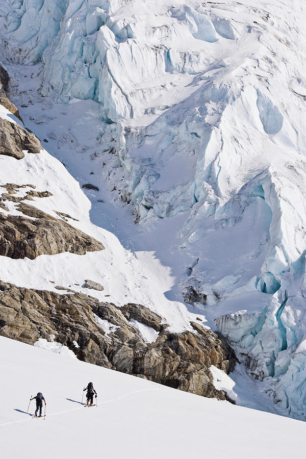 Two Male Adventure Skiers Ski Photograph by Henry Georgi - Fine Art America