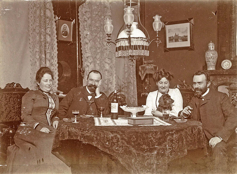 Two Men And Two Women Sitting Around A Table With Glasses Drawing by ...