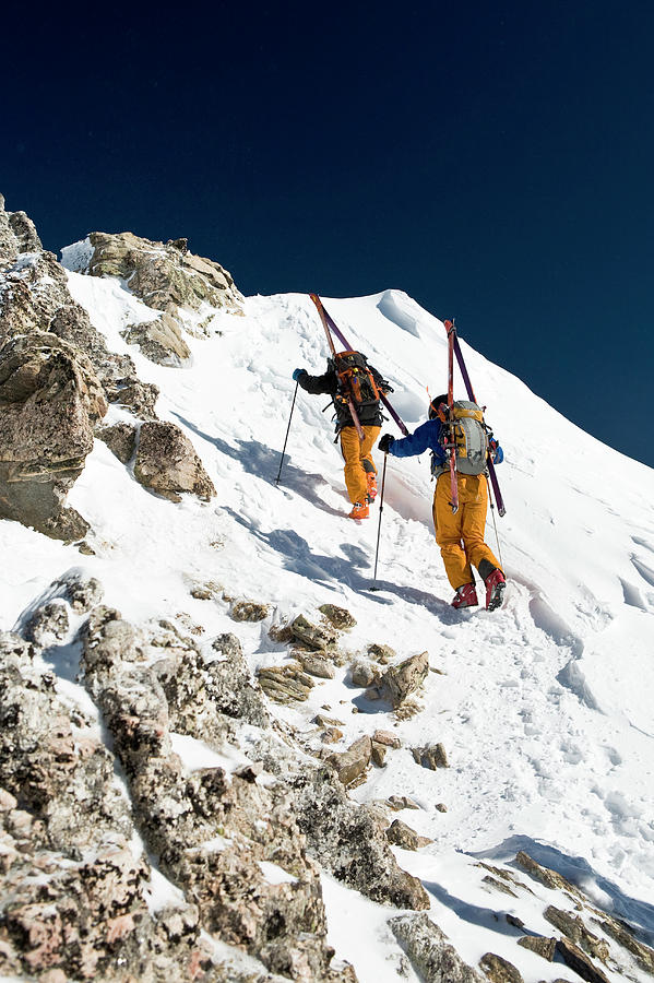 Two Men Backcountry Skiing Hike Photograph by Jen Judge - Fine Art America