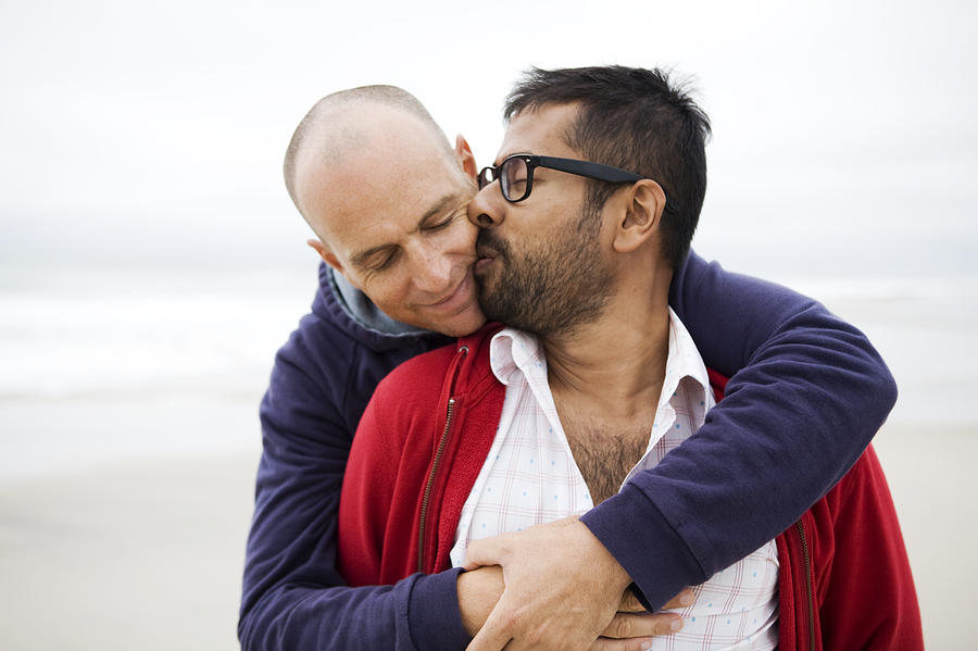 Two Men Kissing On Beach Photograph by Allison Michael Orenstein