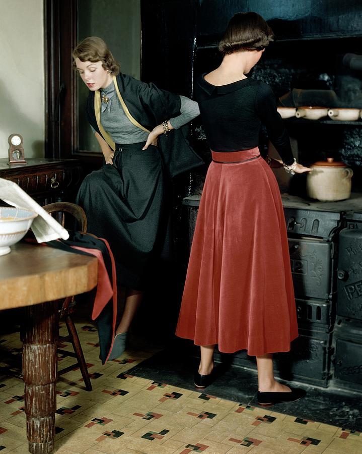 Two Models In A Ski Lodge Kitchen Photograph by Frances McLaughlin-Gill