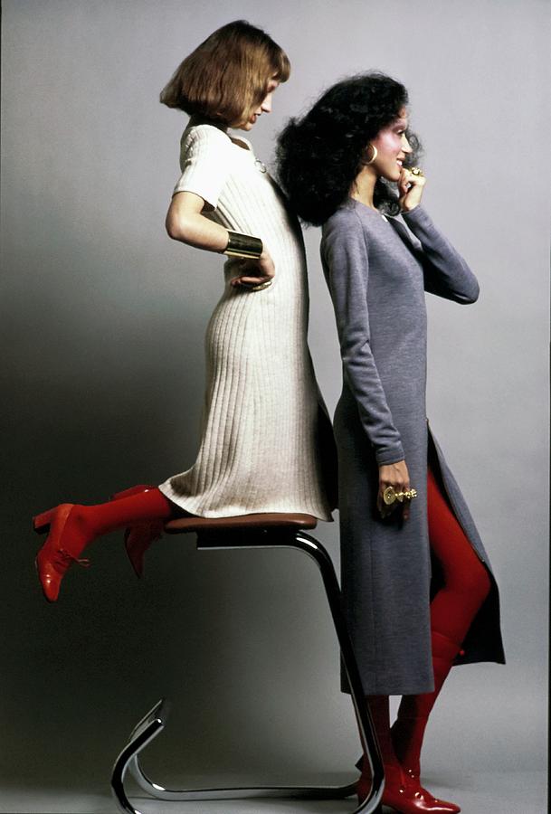Two Models Wearing Knit Dresses Photograph by Bert Stern