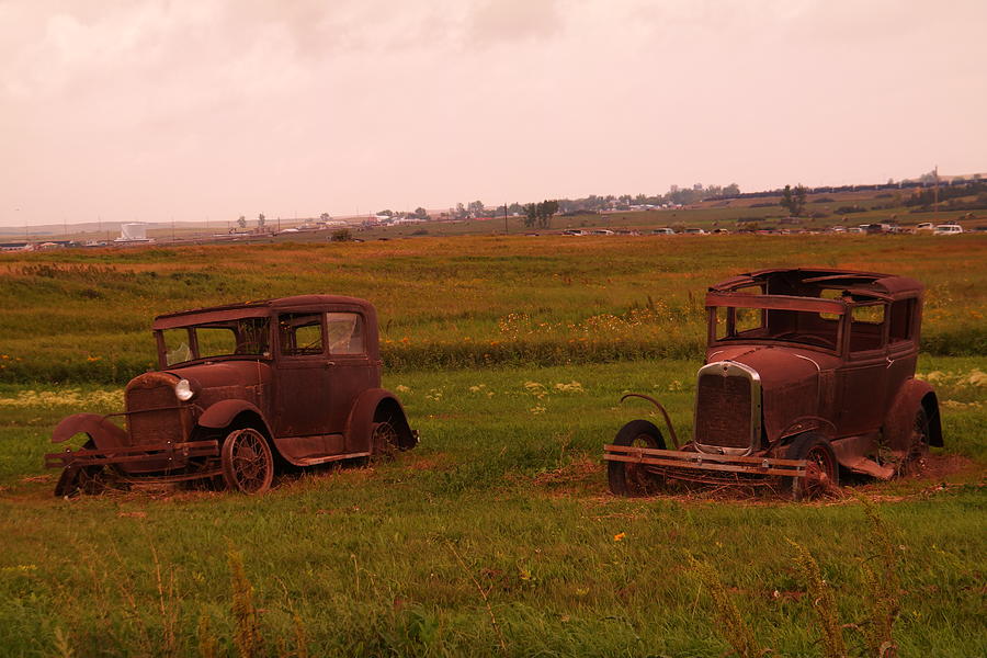Two old cars in Epping North Dakota Photograph by Jeff Swan