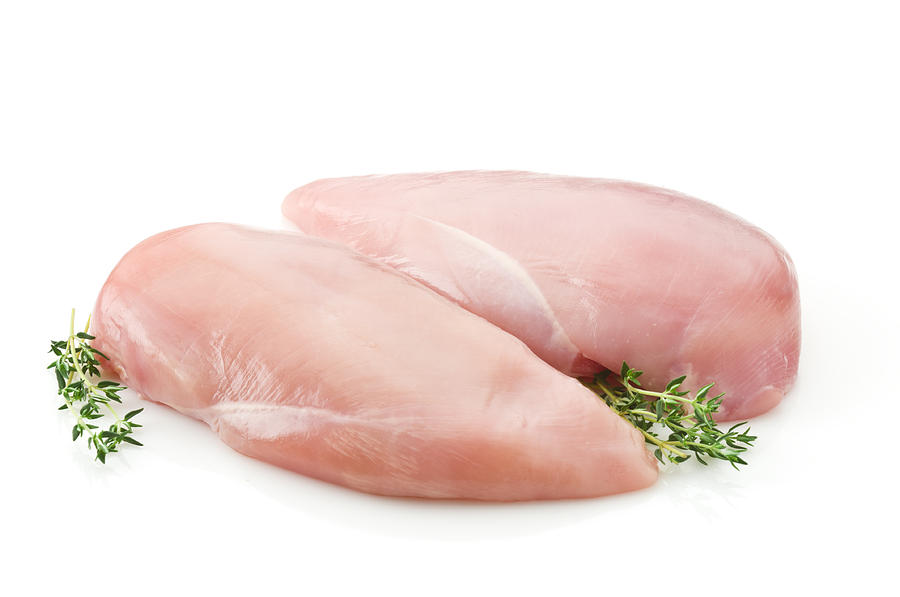 Two raw chicken breast on white backdrop Photograph by Fcafotodigital