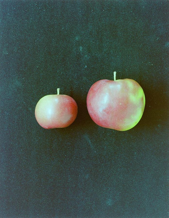 Two Red Apples Photograph by Romulo Yanes