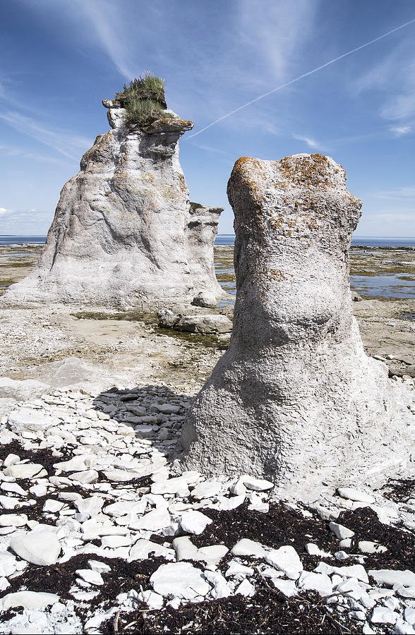 Two sculpted rocks on Naked Isld Photograph by Arkady Kunysz