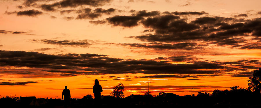 Two Silhouettes in the Sunset Photograph by Semmick Photo