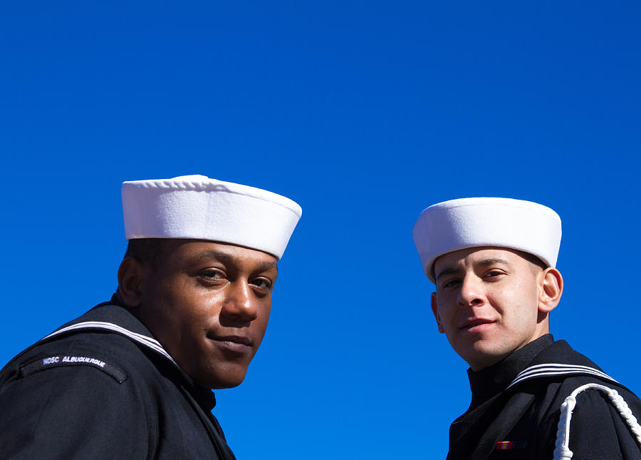 Two US Sailors at Veterans Day Memorial Service, Blue Background Photograph by JannHuizenga
